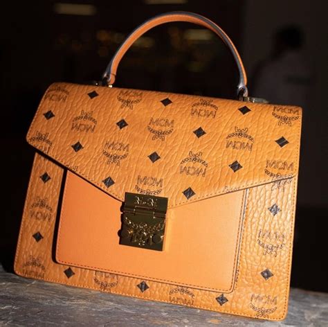 mcm clutch bag fake|mcm bag price.